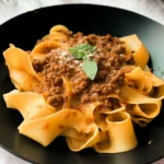 Pappardelle bolognese pasta with rich meat sauce