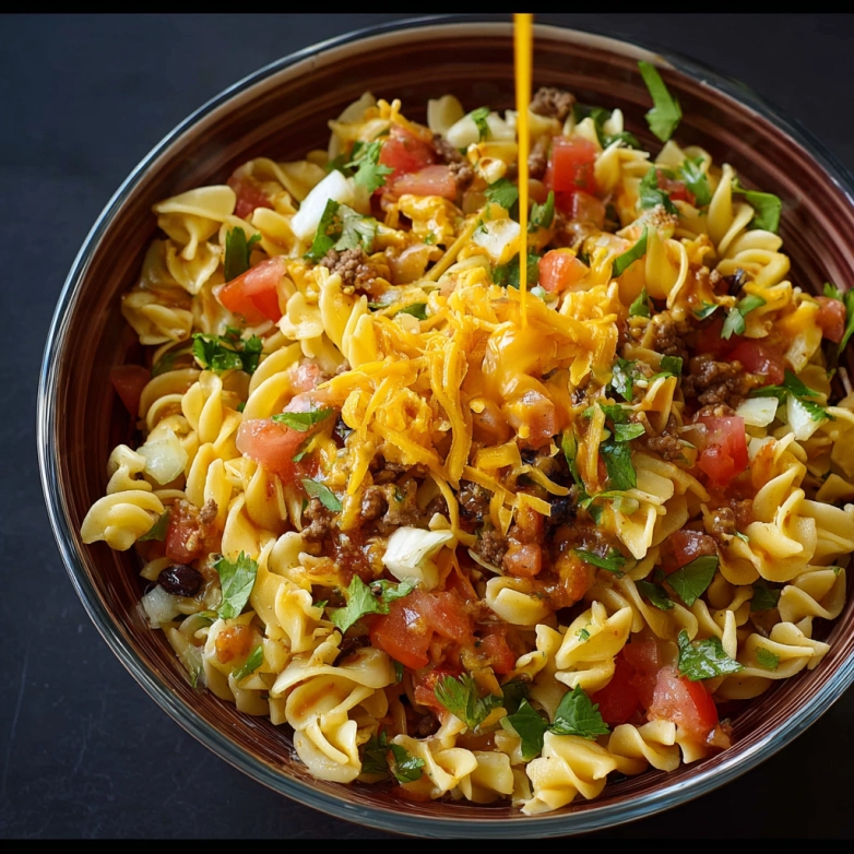 creamy-taco-pasta-salad-closeup Creamy taco pasta salad recipe served with fresh veggies and cheese topping