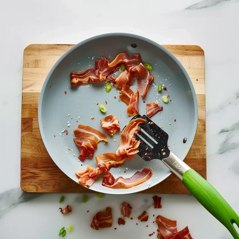 Step-by-Step Bacon Ranch Pasta Salad Recipe Mixing pasta, bacon, cheese, and ranch dressing together in a large bowl