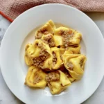 Authentic Pumpkin Cappellacci Pasta with butter and sage sauce