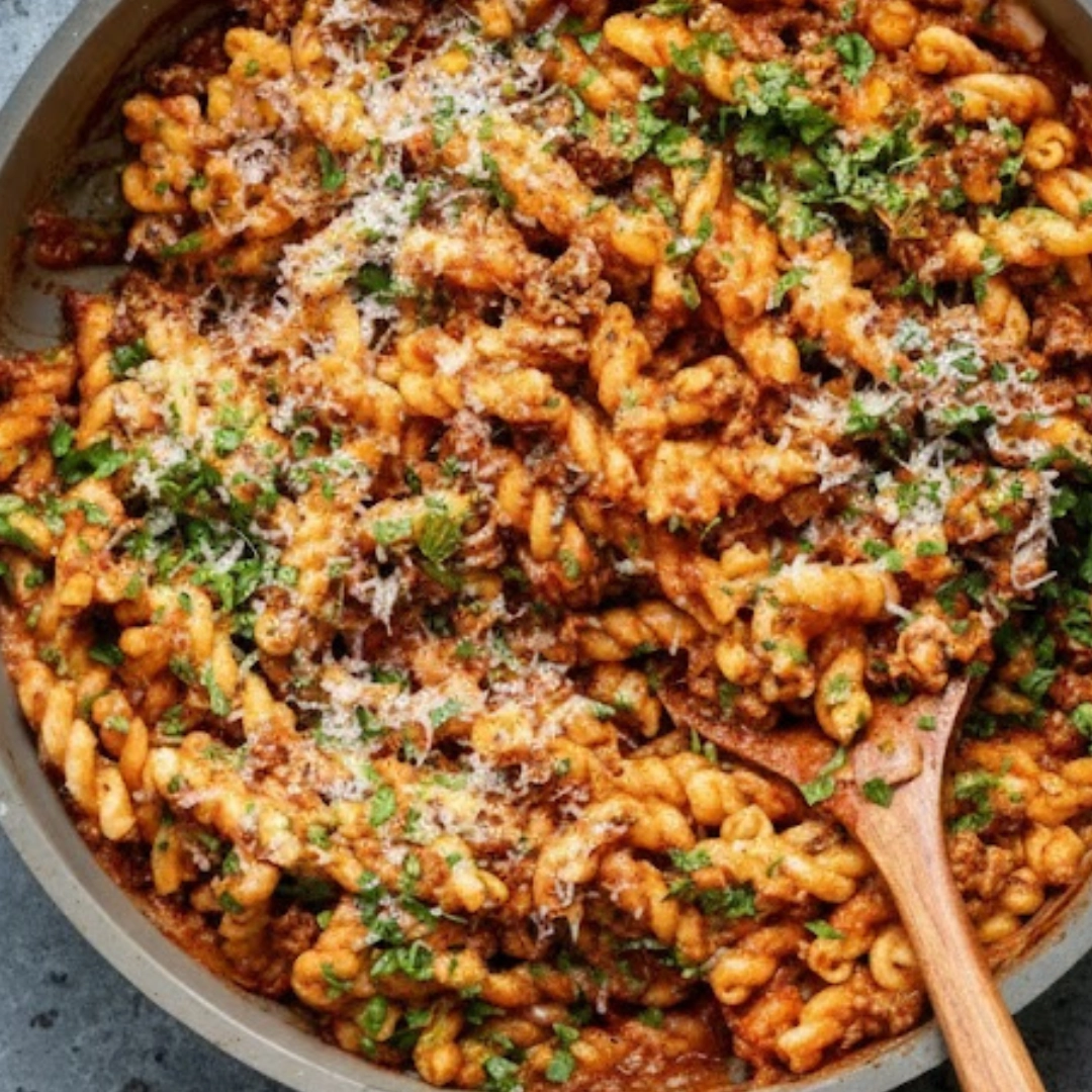 Creamy, hearty plate of One Pot Ground Beef Pasta Recipe garnished with basil and Parmesan. Creamy, hearty plate of One Pot Ground Beef Pasta Recipe garnished with basil and Parmesan.